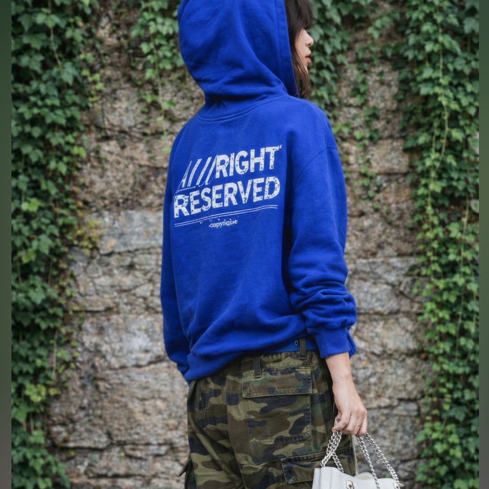 COPYRIGHT Blue Hooded Graphic Sweatshirt, M